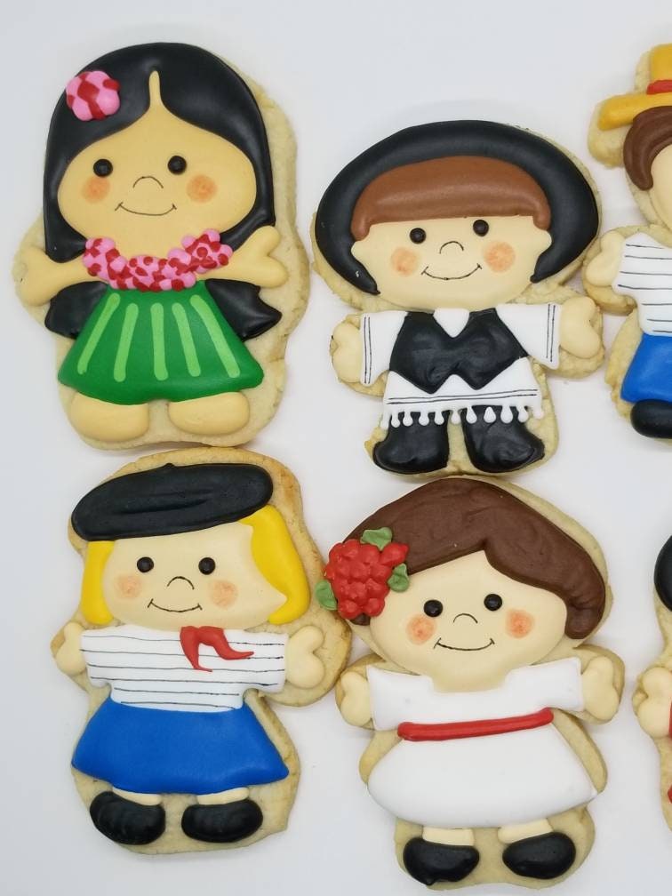 Its a small world inspired cookies One Dozen (12) - Ladybug bake shop